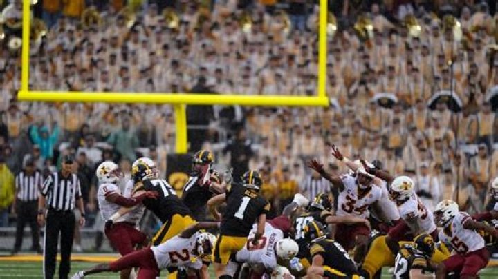 FILE - Iowa place kicker Aaron Blom (1) misses a field goal at the end of an NCAA college football game against Iowa State, Saturday, Sept. 10, 2022, in Iowa City, Iowa. Iowa State won 10-7. A former walk-on kicker at the University of Iowa was charged Wednesday, Aug. 2, 2023, in connection with wagering on Hawkeyes sports events &mdash; one day after Iowa State quarterback Hunter Dekkers was accused of committing the same offense. The criminal complaint filed in Johnson County said Aaron Blom, who was on the Iowa roster from 2020-22, tampered with records related to an Iowa Criminal Division investigation into sports gambling. (AP Photo/Charlie Neibergall, File)